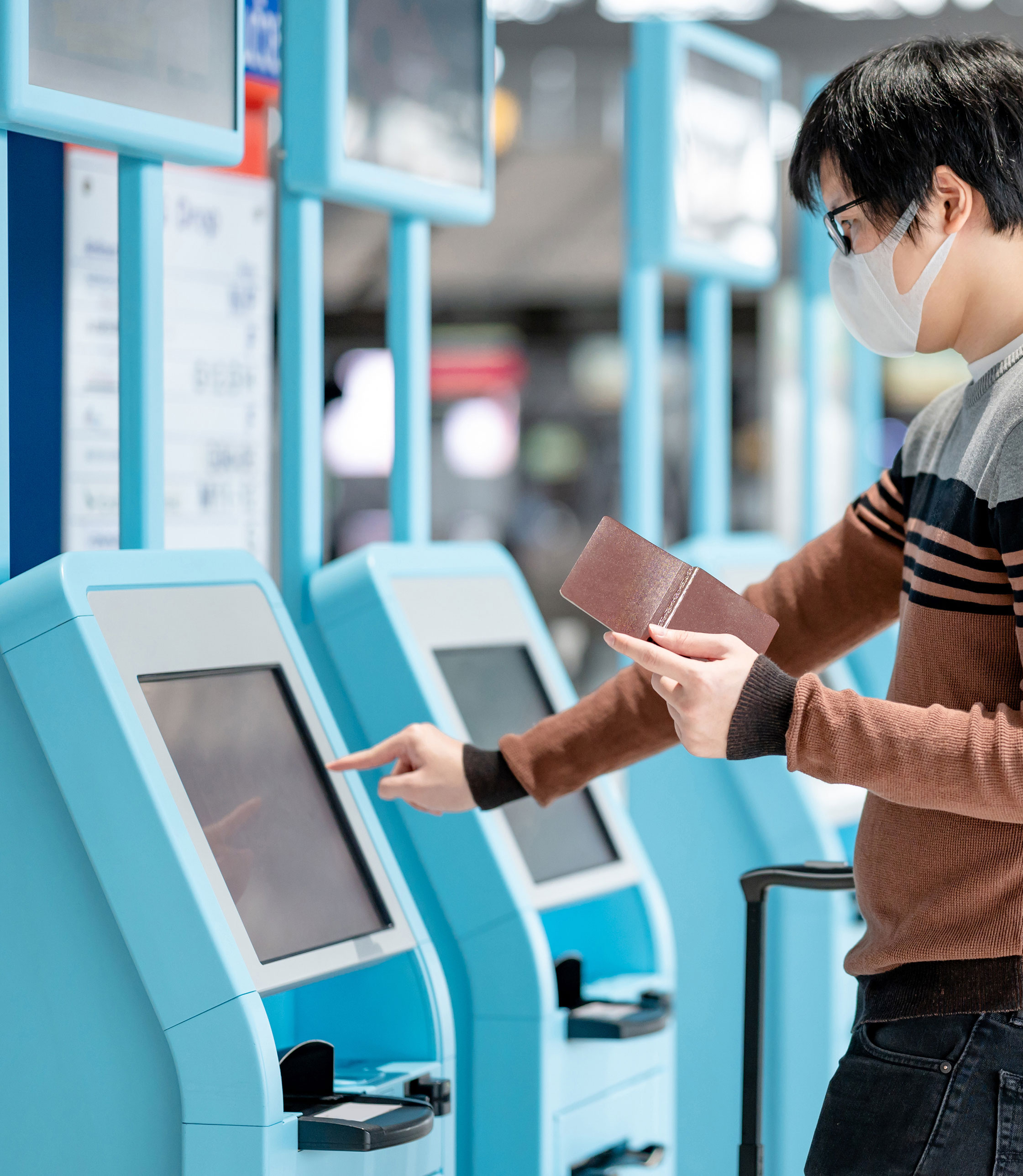 man touching vending kiosk with lcd touchscreen display